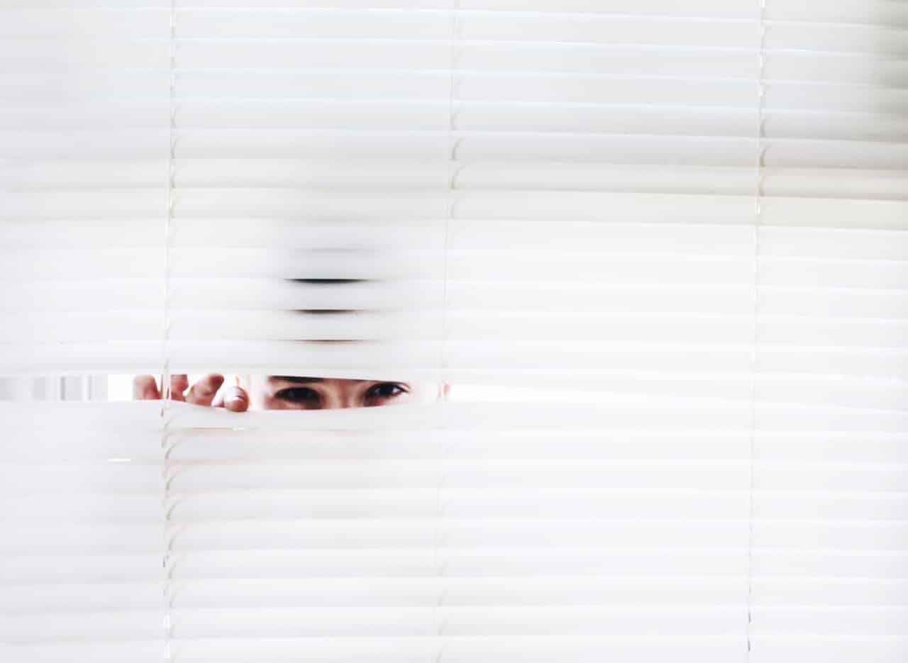 person peeking spying
