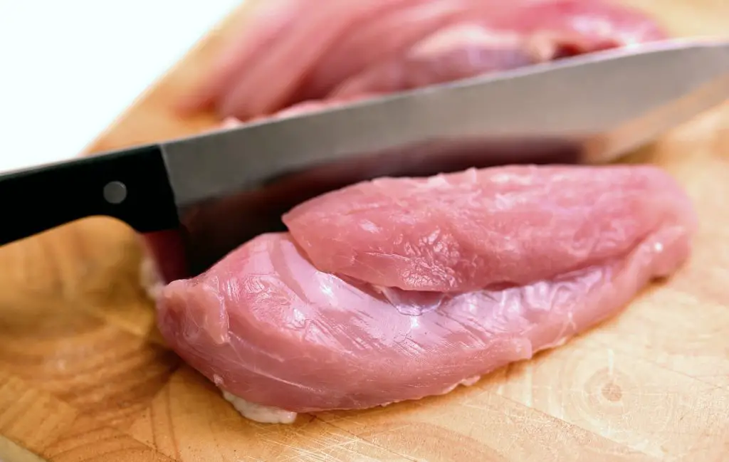 knife cutting meat